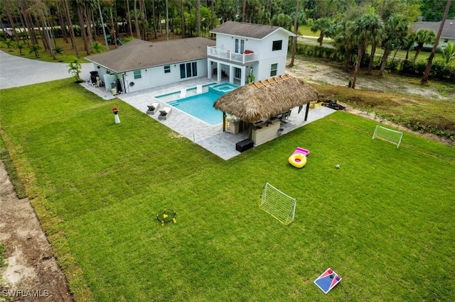 675 Logan Blvd S, Naples, FL 34119 - aerial view of property and surrounding area featuring a pool area