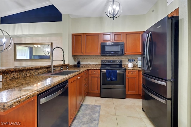 20310 Estero Gardens Cir Unit 203, Estero, FL 33928 - kitchen featuring freestanding refrigerator, dishwashing machine, stainless steel range with electric stovetop, decorative backsplash, and dark stone counters