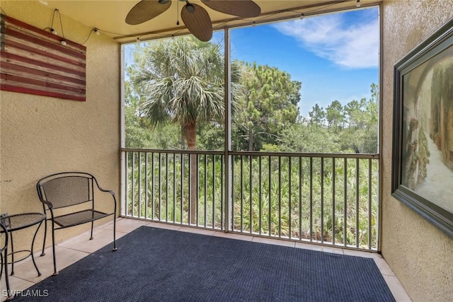 20310 Estero Gardens Cir Unit 203, Estero, FL 33928 - unfurnished sunroom featuring a ceiling fan and healthy amount of natural light