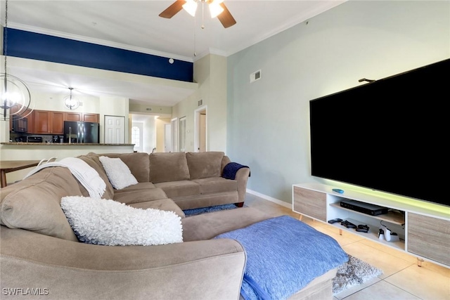 20310 Estero Gardens Cir Unit 203, Estero, FL 33928 - tiled living room with ceiling fan and ornamental molding