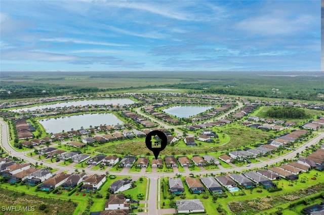 19280 Elston Way, Estero, FL 33928 - aerial view of residential area featuring a large body of water
