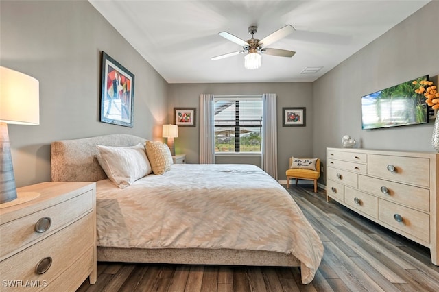 19280 Elston Way, Estero, FL 33928 - bedroom with dark wood finished floors and a ceiling fan