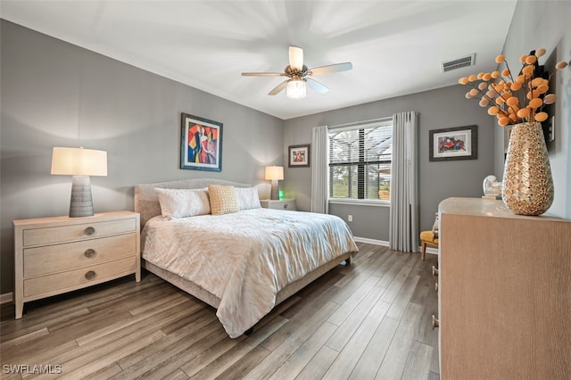 19280 Elston Way, Estero, FL 33928 - bedroom with wood finished floors and a ceiling fan
