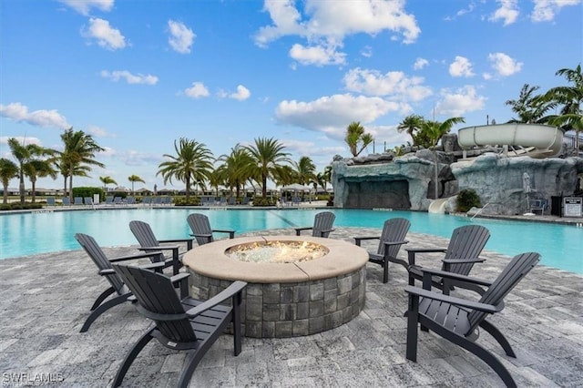 19280 Elston Way, Estero, FL 33928 - community pool with an outdoor fire pit and a patio area