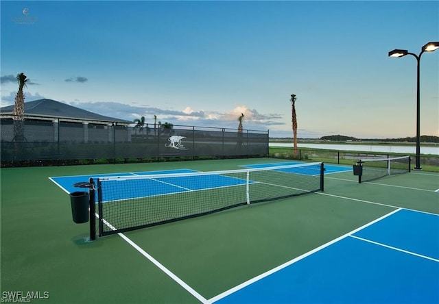 19280 Elston Way, Estero, FL 33928 - view of tennis court featuring community basketball court and a water view
