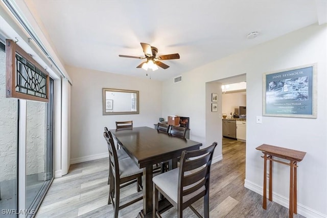 402 Bristle Cone Ln Unit 2, Naples, FL 34113 - dining space featuring light wood finished floors and a ceiling fan