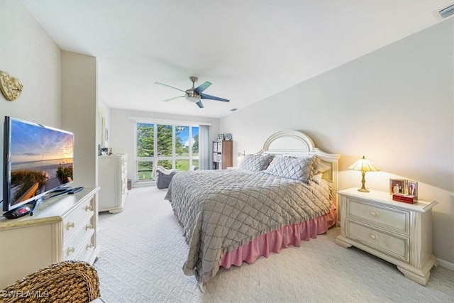 402 Bristle Cone Ln Unit 2, Naples, FL 34113 - bedroom featuring light carpet and a ceiling fan