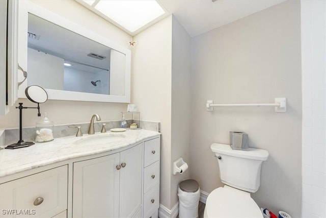 402 Bristle Cone Ln Unit 2, Naples, FL 34113 - bathroom featuring vanity and toilet