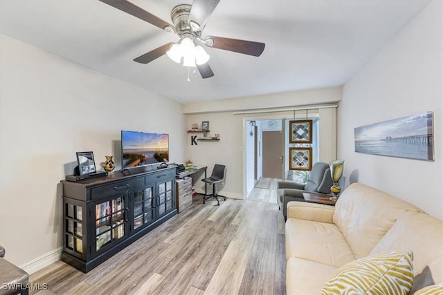 402 Bristle Cone Ln Unit 2, Naples, FL 34113 - living room featuring wood finished floors and a ceiling fan