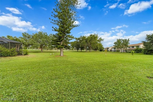 402 Bristle Cone Ln Unit 2, Naples, FL 34113 - view of grassy yard