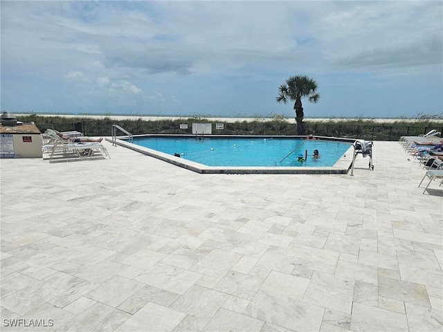180 Seaview Ct Unit 215, Marco Island, FL 34145 - community pool with a patio