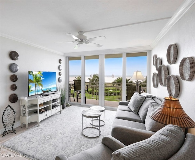 180 Seaview Ct Unit 215, Marco Island, FL 34145 - living area featuring crown molding, ceiling fan, wood finished floors, and expansive windows