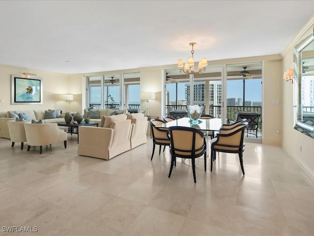 4651 Gulf Shore Blvd N Unit 1605, Naples, FL 34103 - dining area featuring a chandelier and a ceiling fan