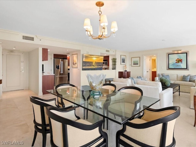 4651 Gulf Shore Blvd N Unit 1605, Naples, FL 34103 - dining area with a chandelier