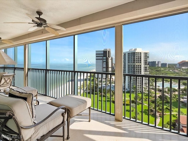 4651 Gulf Shore Blvd N Unit 1605, Naples, FL 34103 - sunroom with a water view, plenty of natural light, and a city view