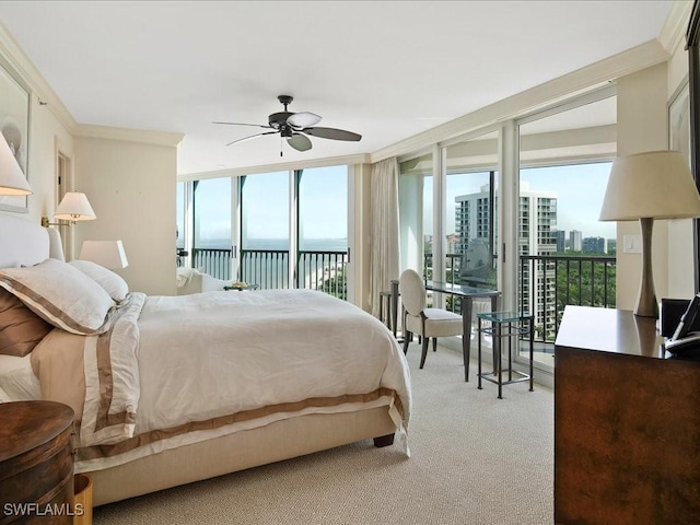 4651 Gulf Shore Blvd N Unit 1605, Naples, FL 34103 - bedroom featuring access to exterior, carpet flooring, floor to ceiling windows, and a water view