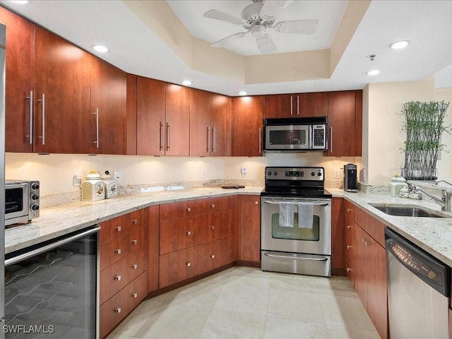 4651 Gulf Shore Blvd N Unit 1605, Naples, FL 34103 - kitchen featuring stainless steel appliances, wine cooler, light stone counters, ceiling fan, and recessed lighting