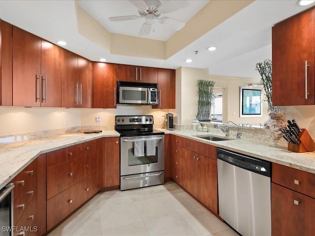 4651 Gulf Shore Blvd N Unit 1605, Naples, FL 34103 - kitchen featuring stainless steel appliances, light stone counters, a ceiling fan, recessed lighting, and beverage cooler