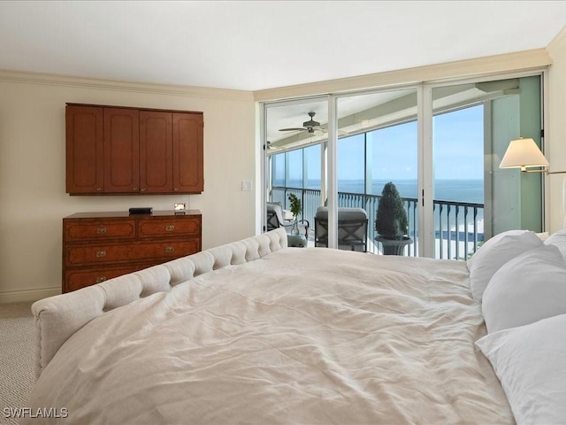 4651 Gulf Shore Blvd N Unit 1605, Naples, FL 34103 - bedroom featuring access to exterior, a water view, and crown molding
