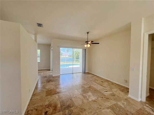 812 Grand Rapids Blvd, Naples, FL 34120 - empty room with ceiling fan and baseboards