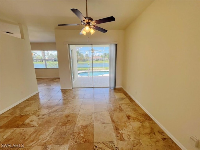 812 Grand Rapids Blvd, Naples, FL 34120 - spare room with ceiling fan and vaulted ceiling