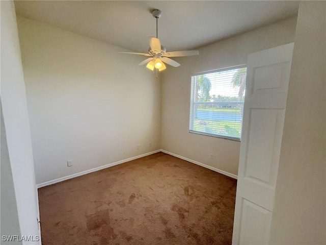 812 Grand Rapids Blvd, Naples, FL 34120 - carpeted spare room featuring a ceiling fan and baseboards