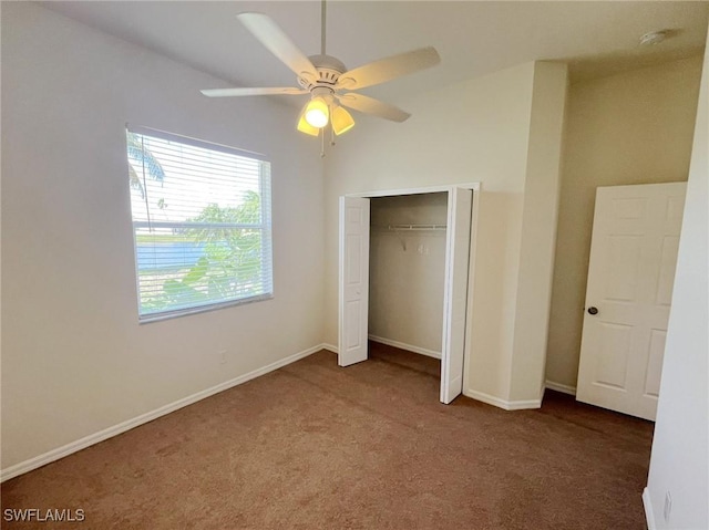 812 Grand Rapids Blvd, Naples, FL 34120 - unfurnished bedroom with carpet, a closet, and ceiling fan