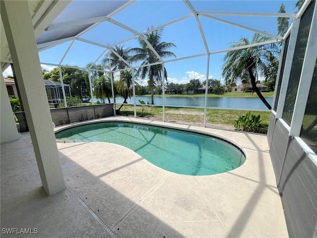 812 Grand Rapids Blvd, Naples, FL 34120 - outdoor pool with a water view, a patio, and glass enclosure