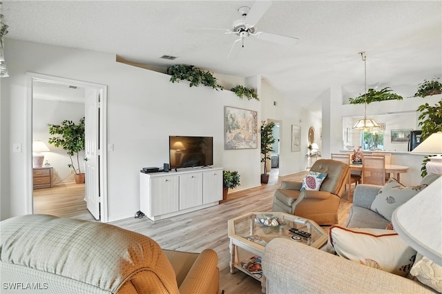 800 New Waterford Dr Unit A202, Naples, FL 34104 - living room with ceiling fan, light wood finished floors, and lofted ceiling