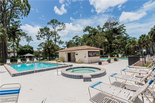1733 Courtyard Way Unit B205, Naples, FL 34112 - community pool with a community hot tub and a patio