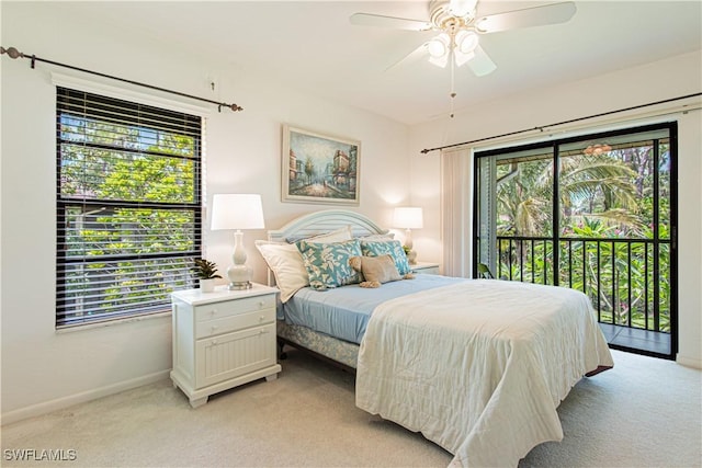 1733 Courtyard Way Unit B205, Naples, FL 34112 - bedroom with light carpet, access to exterior, multiple windows, and a ceiling fan