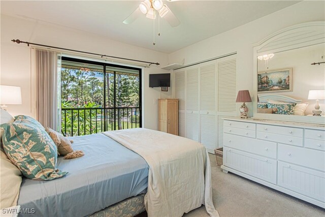 1733 Courtyard Way Unit B205, Naples, FL 34112 - bedroom with access to outside, light carpet, a closet, and a ceiling fan