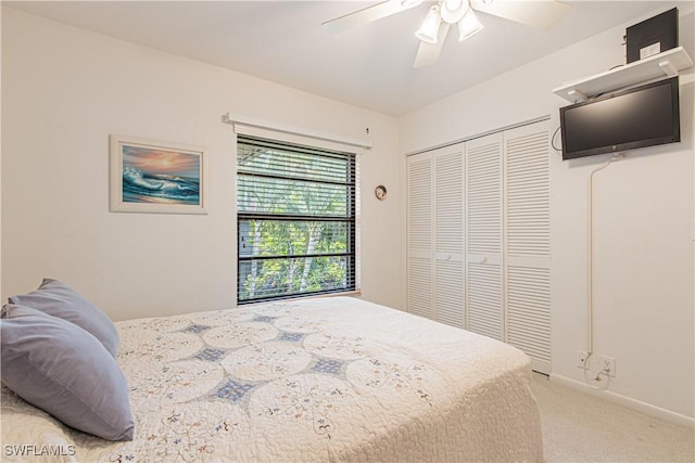1733 Courtyard Way Unit B205, Naples, FL 34112 - carpeted bedroom with a closet and ceiling fan