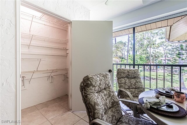 1733 Courtyard Way Unit B205, Naples, FL 34112 - office space with light tile patterned flooring and a textured wall