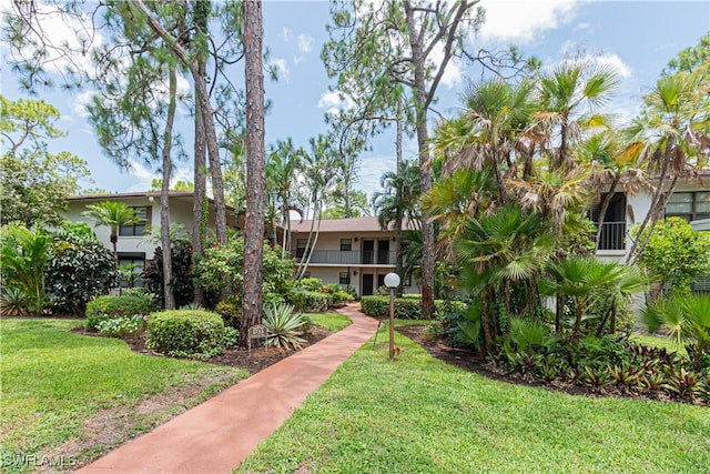 1733 Courtyard Way Unit B205, Naples, FL 34112 - surrounding community featuring a lawn