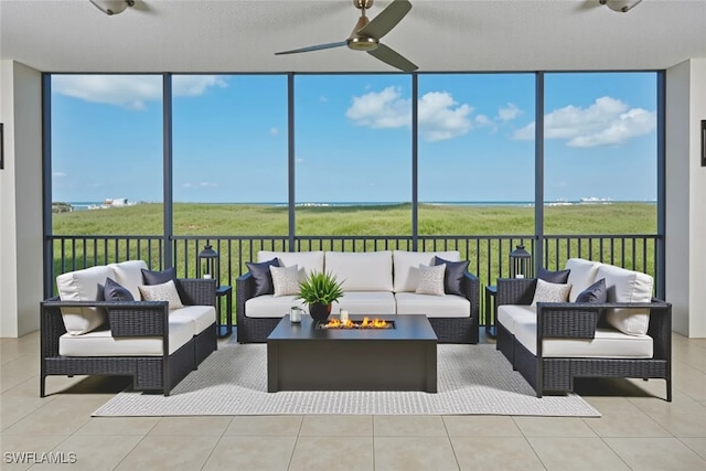 24011 Via Castella Dr Unit 2402, Bonita Springs, FL 34134 - sunroom with an outdoor living space with a fire pit and a ceiling fan