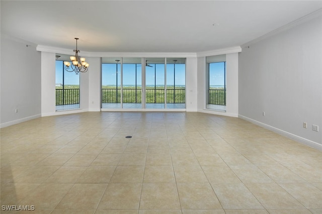 24011 Via Castella Dr Unit 2402, Bonita Springs, FL 34134 - empty room with ornamental molding, a chandelier, and light tile patterned floors
