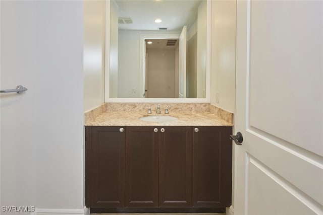 24011 Via Castella Dr Unit 2402, Bonita Springs, FL 34134 - bathroom featuring vanity and recessed lighting