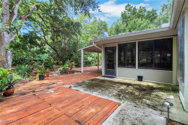 3110 10th Ave SE, Naples, FL 34117 - wooden deck with a sunroom