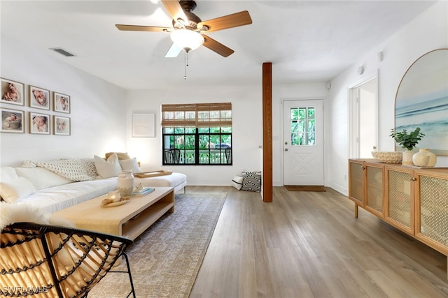 3110 10th Ave SE, Naples, FL 34117 - living area with wood finished floors and a ceiling fan