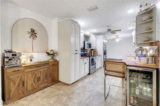 3110 10th Ave SE, Naples, FL 34117 - kitchen with appliances with stainless steel finishes, wine cooler, ceiling fan, open shelves, and recessed lighting