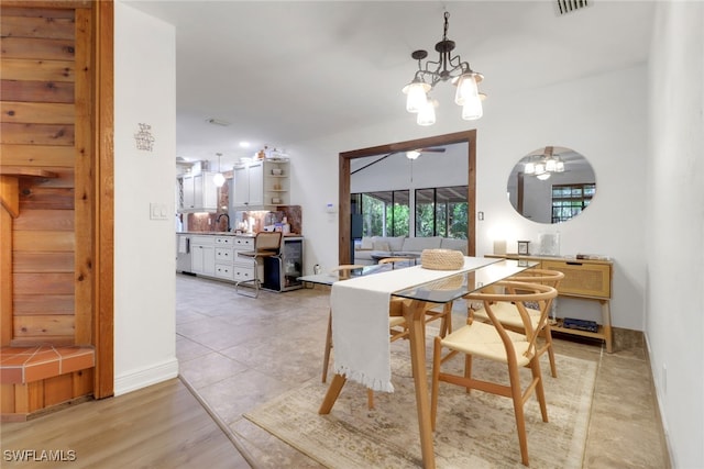 3110 10th Ave SE, Naples, FL 34117 - dining space featuring a chandelier