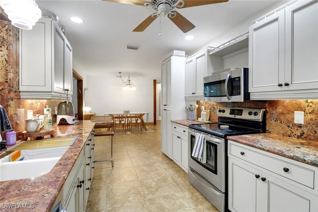 3110 10th Ave SE, Naples, FL 34117 - kitchen featuring stainless steel appliances, a ceiling fan, tasteful backsplash, recessed lighting, and light tile patterned floors