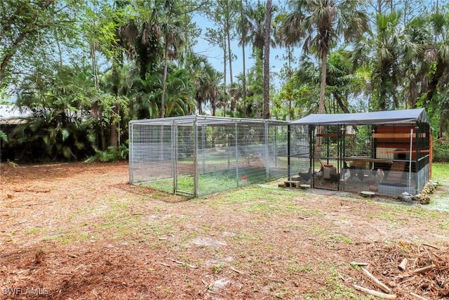 3110 10th Ave SE, Naples, FL 34117 - view of yard featuring an outdoor structure and exterior structure