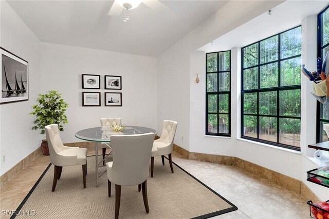 3110 10th Ave SE, Naples, FL 34117 - dining room featuring tile patterned flooring and a ceiling fan