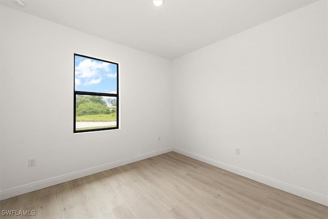9013 Largo Cir, Labelle, FL 33935 - spare room featuring light wood-style floors and recessed lighting