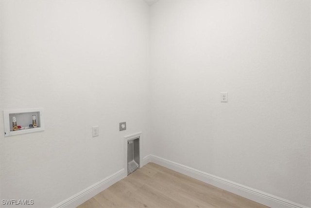 9013 Largo Cir, Labelle, FL 33935 - laundry room with hookup for a washing machine, hookup for an electric dryer, and light wood finished floors