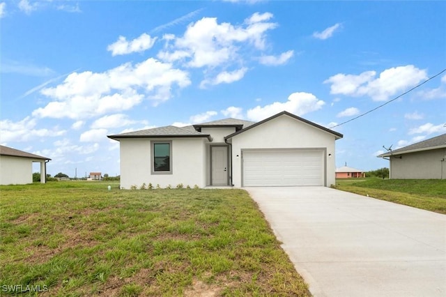 9013 Largo Cir, Labelle, FL 33935 - view of front of house with driveway, stucco siding, a garage, and a front yard