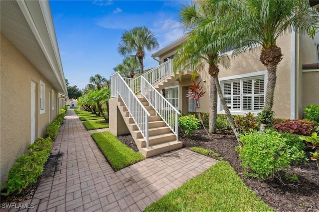 2370 Magnolia Ave Unit 6807, Naples, FL 34112 - view of exterior entry featuring stucco siding