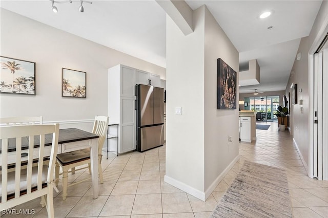 2370 Magnolia Ave Unit 6807, Naples, FL 34112 - hallway with light tile patterned floors and baseboards